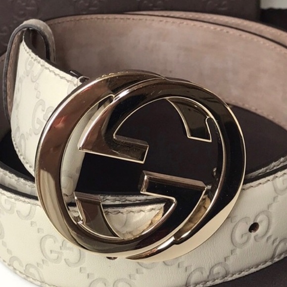 embossed Gucci belt •
